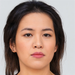 Neutral asian young-adult female with medium  brown hair and brown eyes