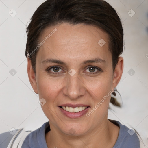 Joyful white adult female with short  brown hair and brown eyes