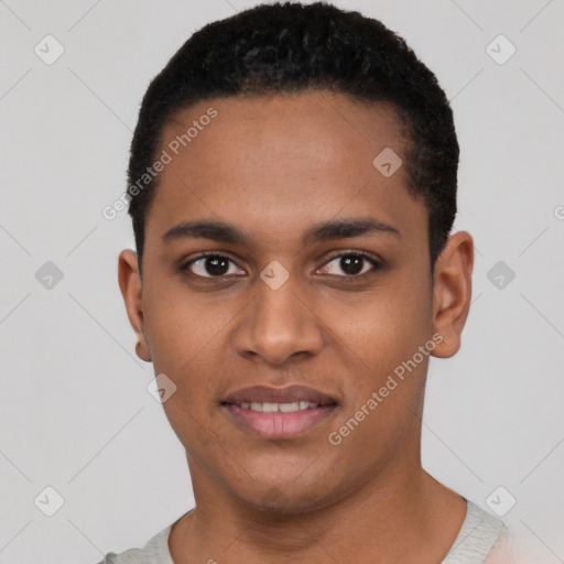 Joyful black young-adult male with short  black hair and brown eyes
