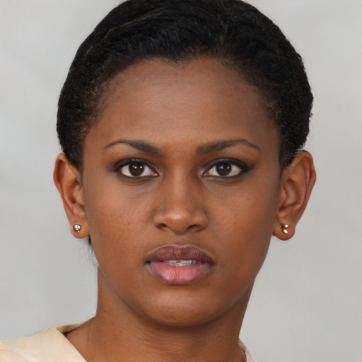 Neutral black young-adult female with short  brown hair and brown eyes