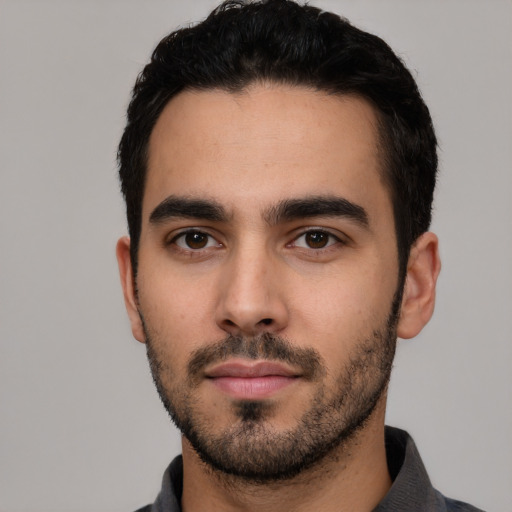 Neutral white young-adult male with short  black hair and brown eyes