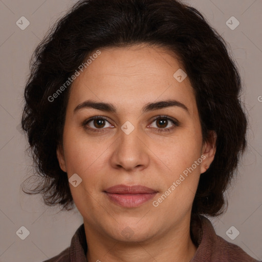 Joyful white adult female with medium  brown hair and brown eyes