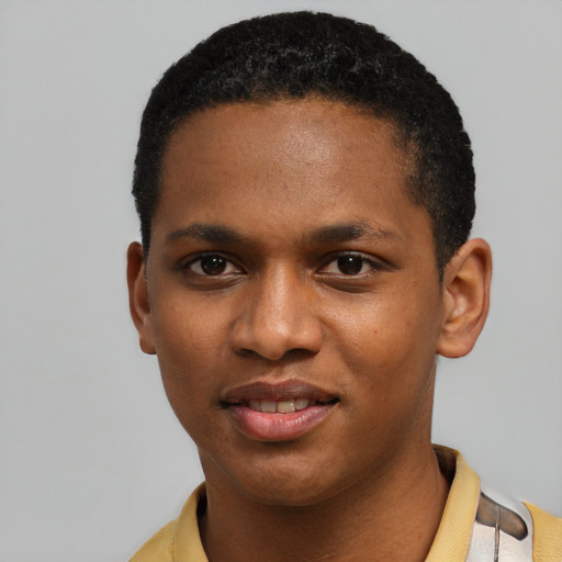 Joyful black young-adult male with short  black hair and brown eyes
