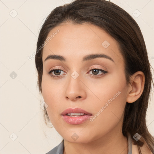 Neutral white young-adult female with long  brown hair and brown eyes