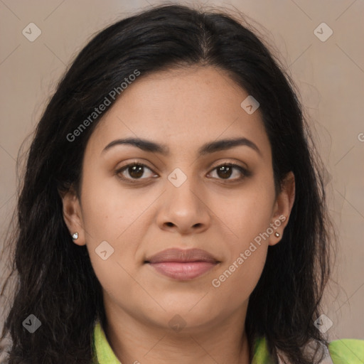 Joyful latino young-adult female with long  brown hair and brown eyes