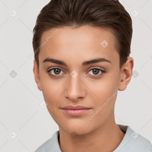 Joyful white young-adult female with short  brown hair and brown eyes