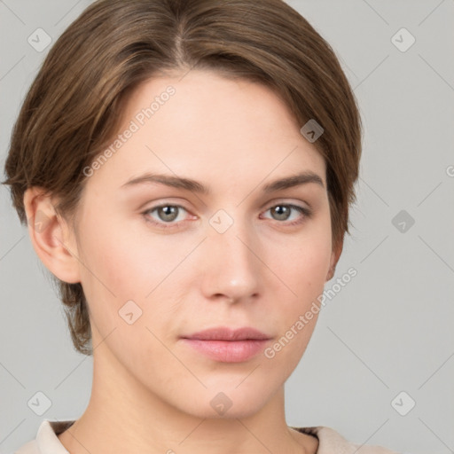 Neutral white young-adult female with short  brown hair and grey eyes