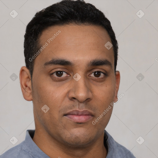Neutral latino young-adult male with short  black hair and brown eyes