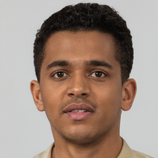 Neutral black young-adult male with short  brown hair and brown eyes