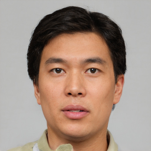 Neutral asian young-adult male with short  black hair and brown eyes