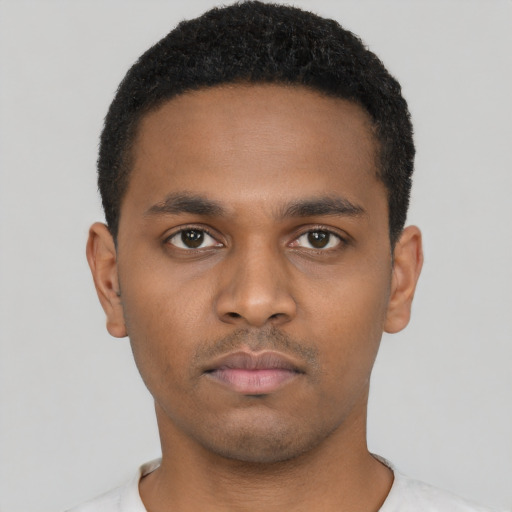 Neutral black young-adult male with short  black hair and brown eyes