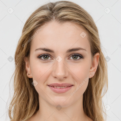 Joyful white young-adult female with long  brown hair and green eyes