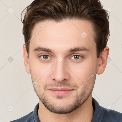 Neutral white young-adult male with short  brown hair and brown eyes