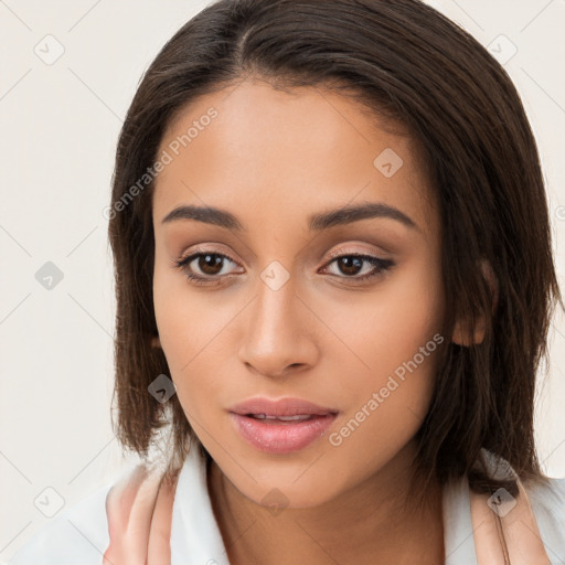 Neutral white young-adult female with long  brown hair and brown eyes