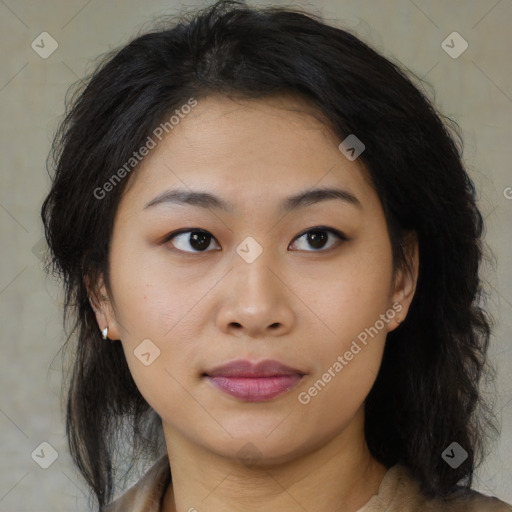 Joyful asian young-adult female with medium  brown hair and brown eyes