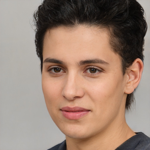 Joyful white young-adult male with medium  brown hair and brown eyes