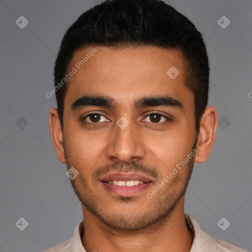 Joyful latino young-adult male with short  black hair and brown eyes