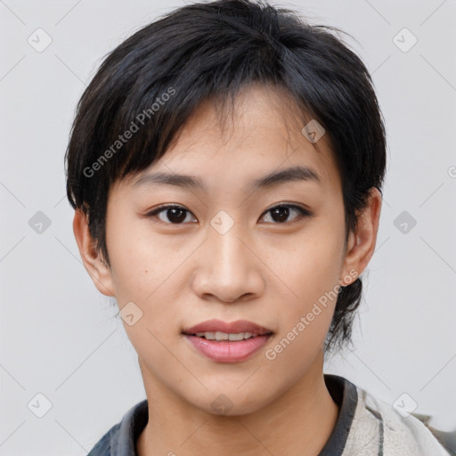 Joyful asian young-adult female with short  black hair and brown eyes