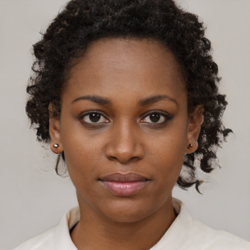 Neutral black young-adult female with short  brown hair and brown eyes