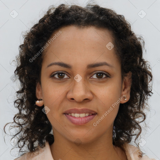 Joyful black young-adult female with long  brown hair and brown eyes