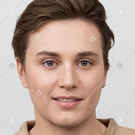 Joyful white young-adult female with short  brown hair and grey eyes