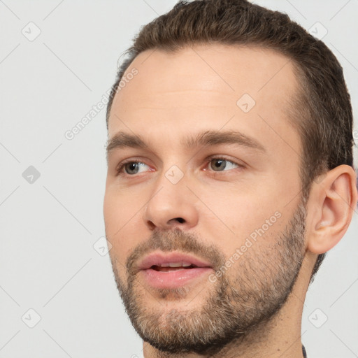 Neutral white young-adult male with short  brown hair and brown eyes