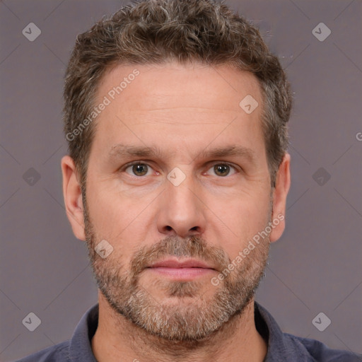 Neutral white adult male with short  brown hair and brown eyes