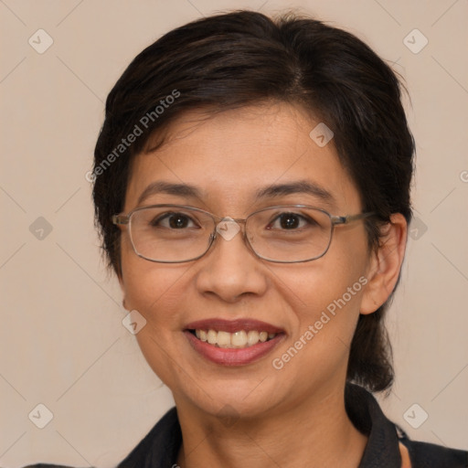 Joyful white adult female with medium  brown hair and brown eyes