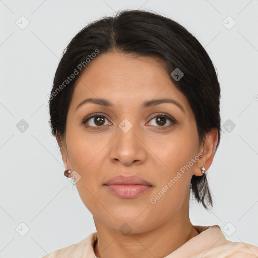 Joyful latino young-adult female with medium  brown hair and brown eyes