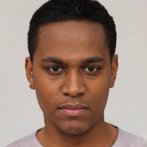 Neutral black young-adult male with short  black hair and brown eyes