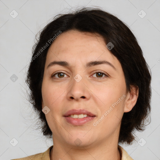 Joyful white adult female with medium  brown hair and brown eyes