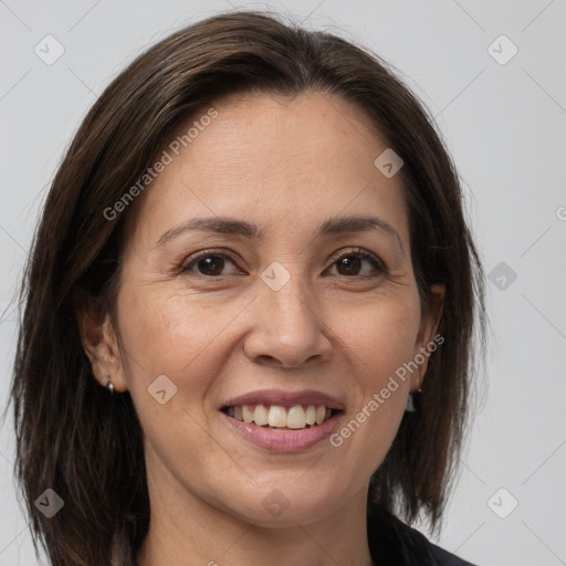 Joyful white adult female with medium  brown hair and brown eyes