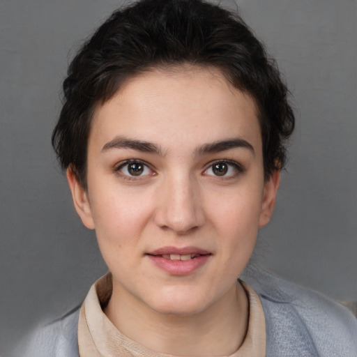 Joyful white young-adult female with short  brown hair and brown eyes