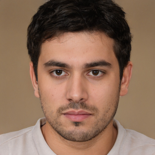 Neutral white young-adult male with short  brown hair and brown eyes