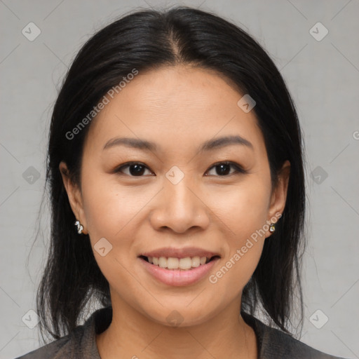 Joyful asian young-adult female with medium  black hair and brown eyes