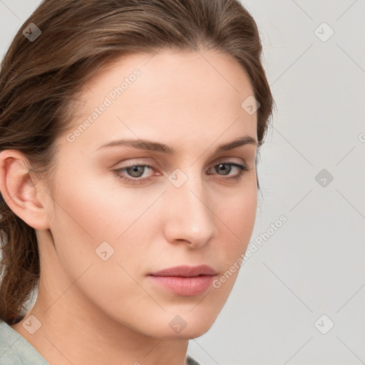 Neutral white young-adult female with medium  brown hair and grey eyes