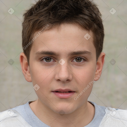 Joyful white child male with short  brown hair and brown eyes