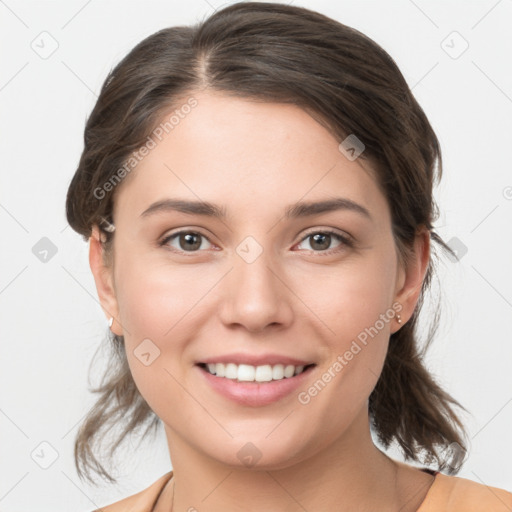 Joyful white young-adult female with medium  brown hair and grey eyes