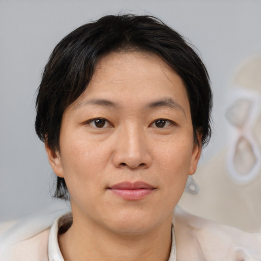 Neutral asian young-adult female with short  brown hair and brown eyes