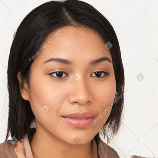 Joyful latino young-adult female with long  brown hair and brown eyes