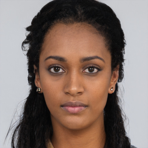 Neutral black young-adult female with long  black hair and brown eyes