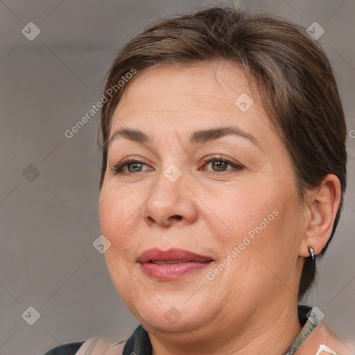 Joyful white adult female with short  brown hair and brown eyes