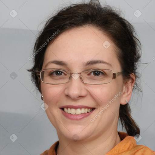 Joyful white adult female with medium  brown hair and brown eyes