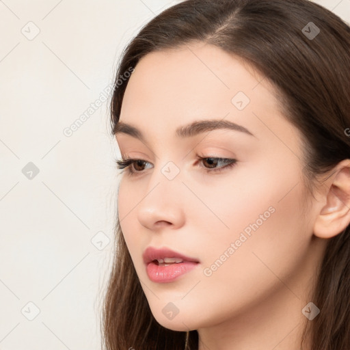 Neutral white young-adult female with long  brown hair and brown eyes