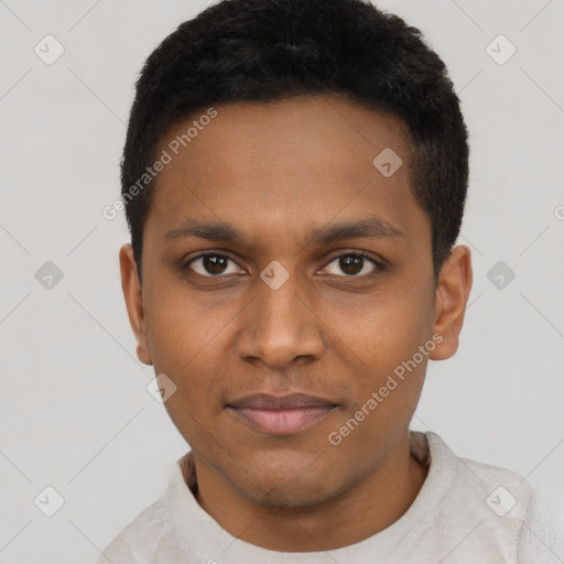 Joyful black young-adult male with short  black hair and brown eyes