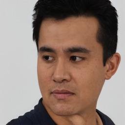 Neutral asian young-adult male with short  black hair and brown eyes