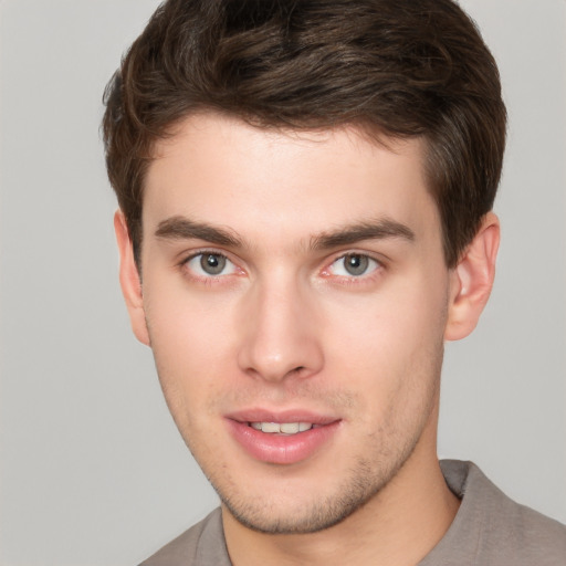 Neutral white young-adult male with short  brown hair and brown eyes