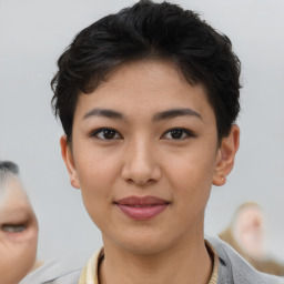 Joyful asian young-adult female with short  brown hair and brown eyes