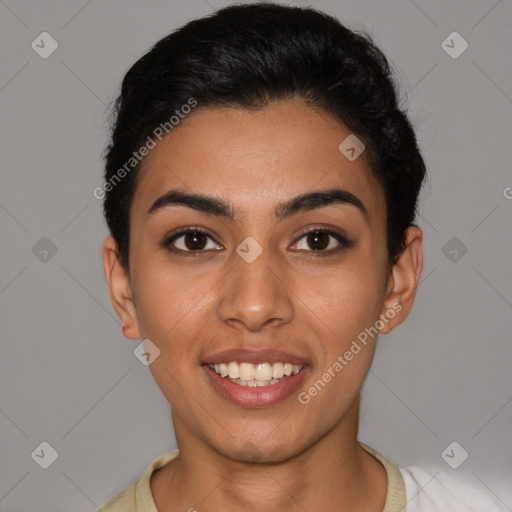 Joyful latino young-adult female with short  brown hair and brown eyes