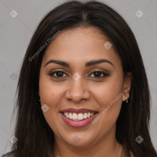 Joyful latino young-adult female with long  brown hair and brown eyes